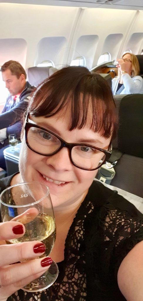 Champagne i business class.